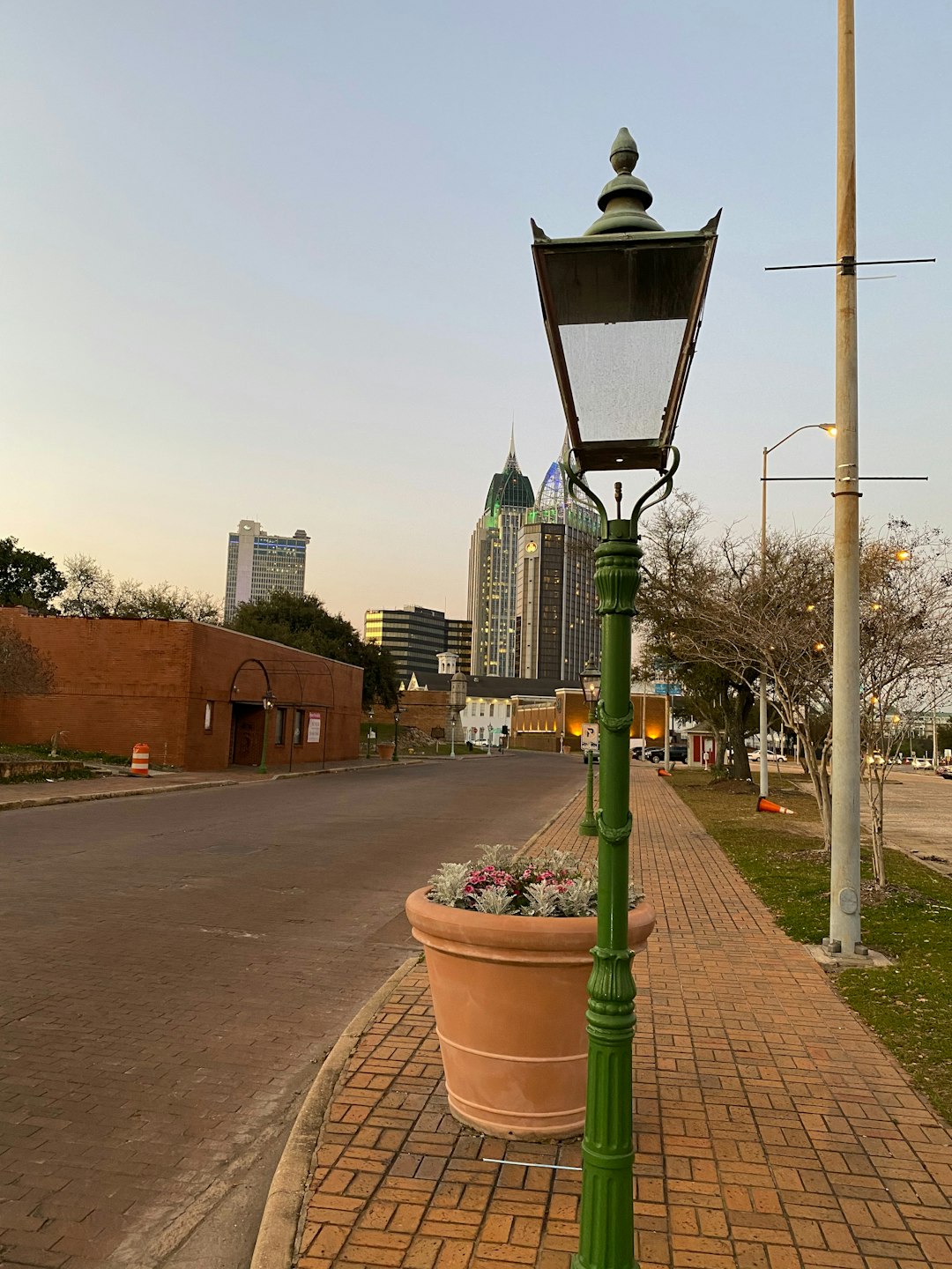 Intelligent systems in mobile apps by Stack Interface A lamp post with a potted plant on the side of it