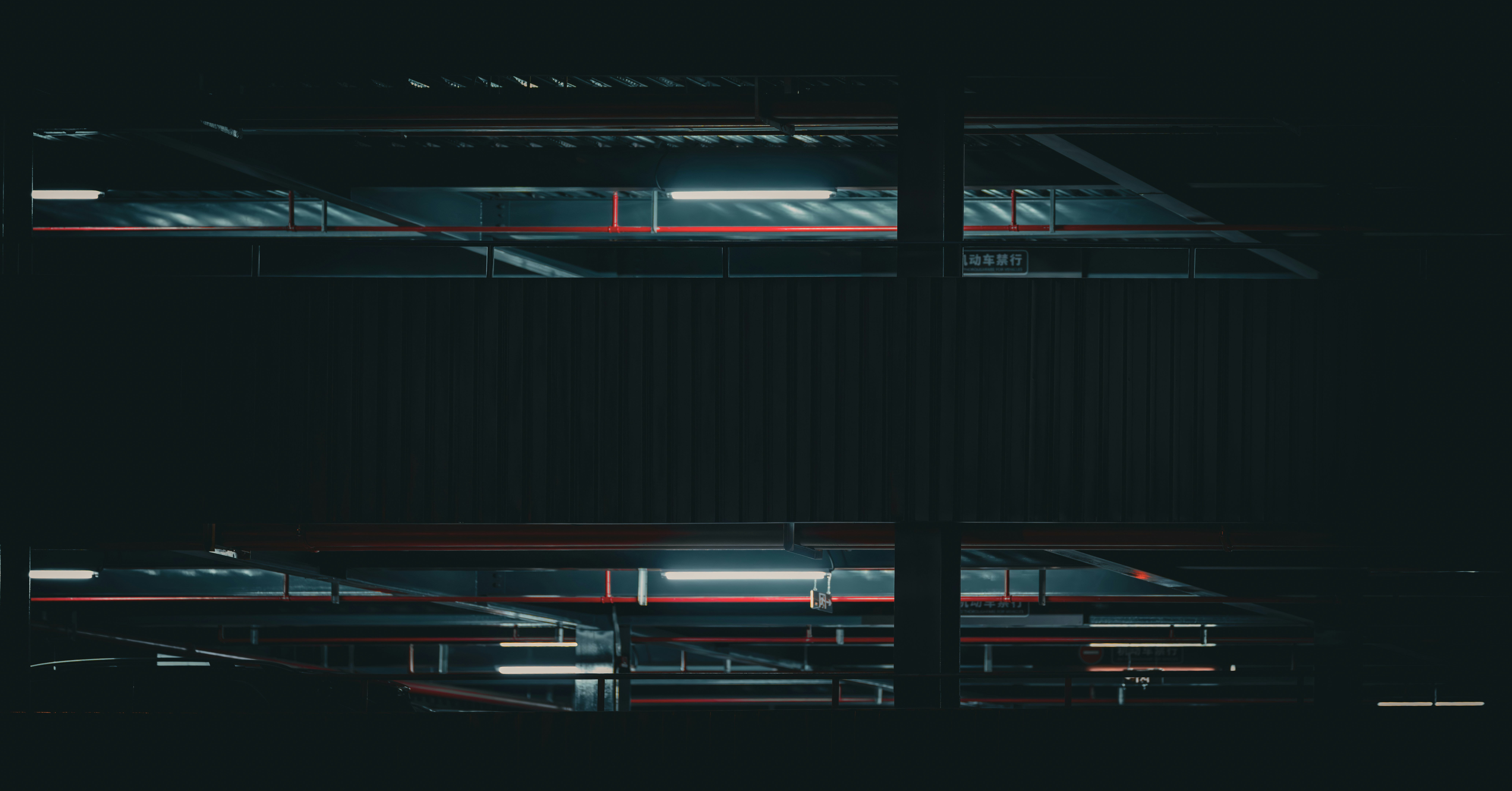 ❓ FAQ: Your Burning Node.js Questions Answered by Stack Interface A black and white photo of a window in the dark